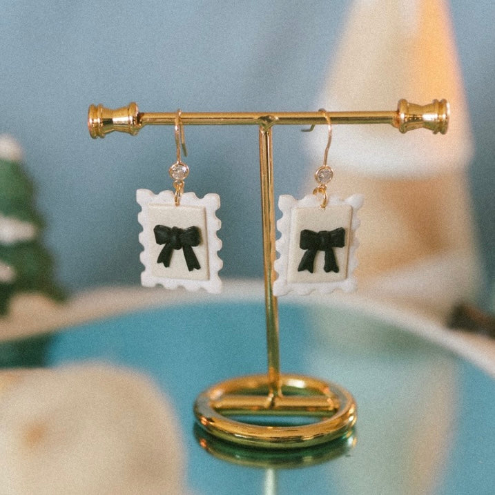 bow postage stamp dangles