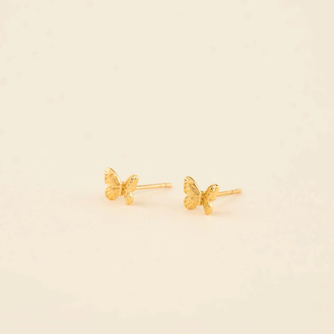 butterfly gold stud earrings